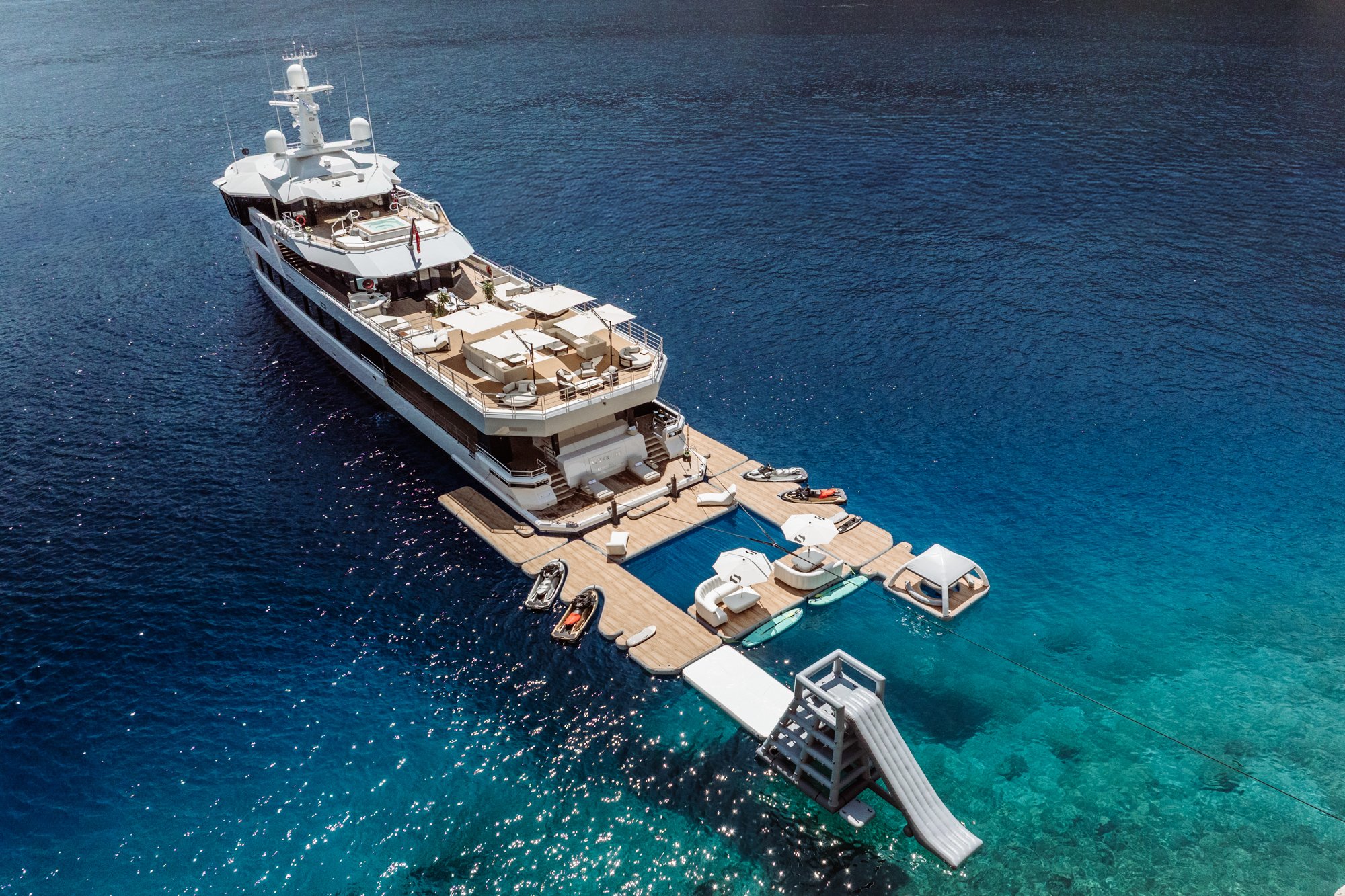 AFTER YOU — Aerial beach club with sea pool, slide and water toys