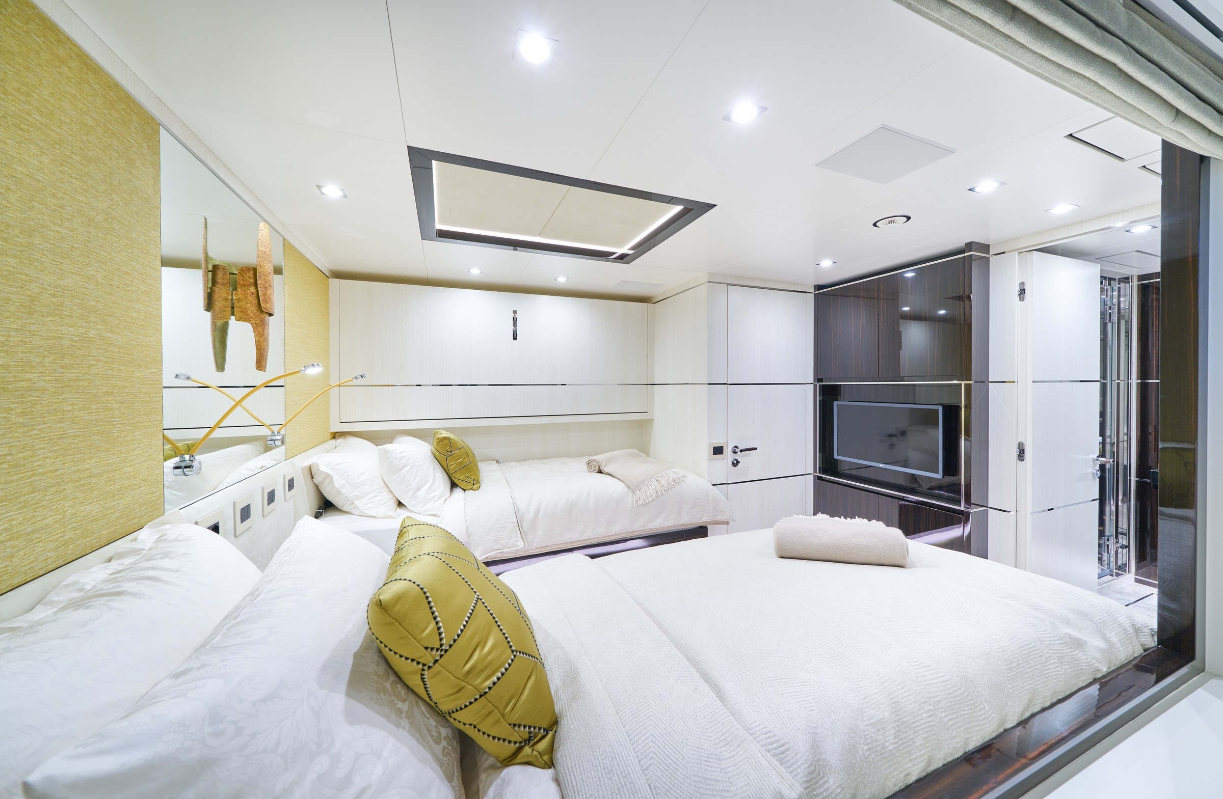 HAPPY ME — Twin guest cabin with yellow accents