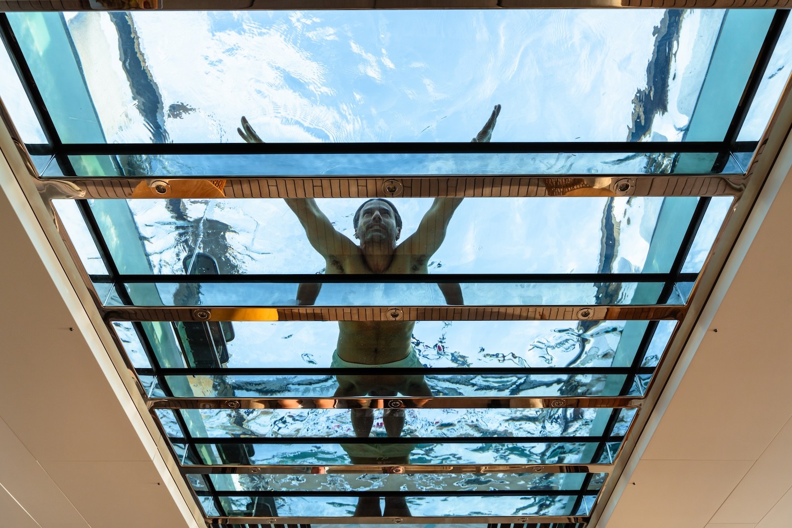Looking up through R.M.F glass-bottom swimming pool