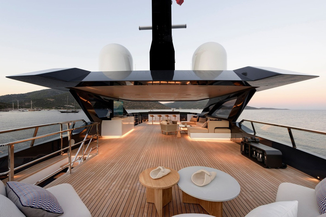 LEGASEA — Sun deck lounge and bar at dusk