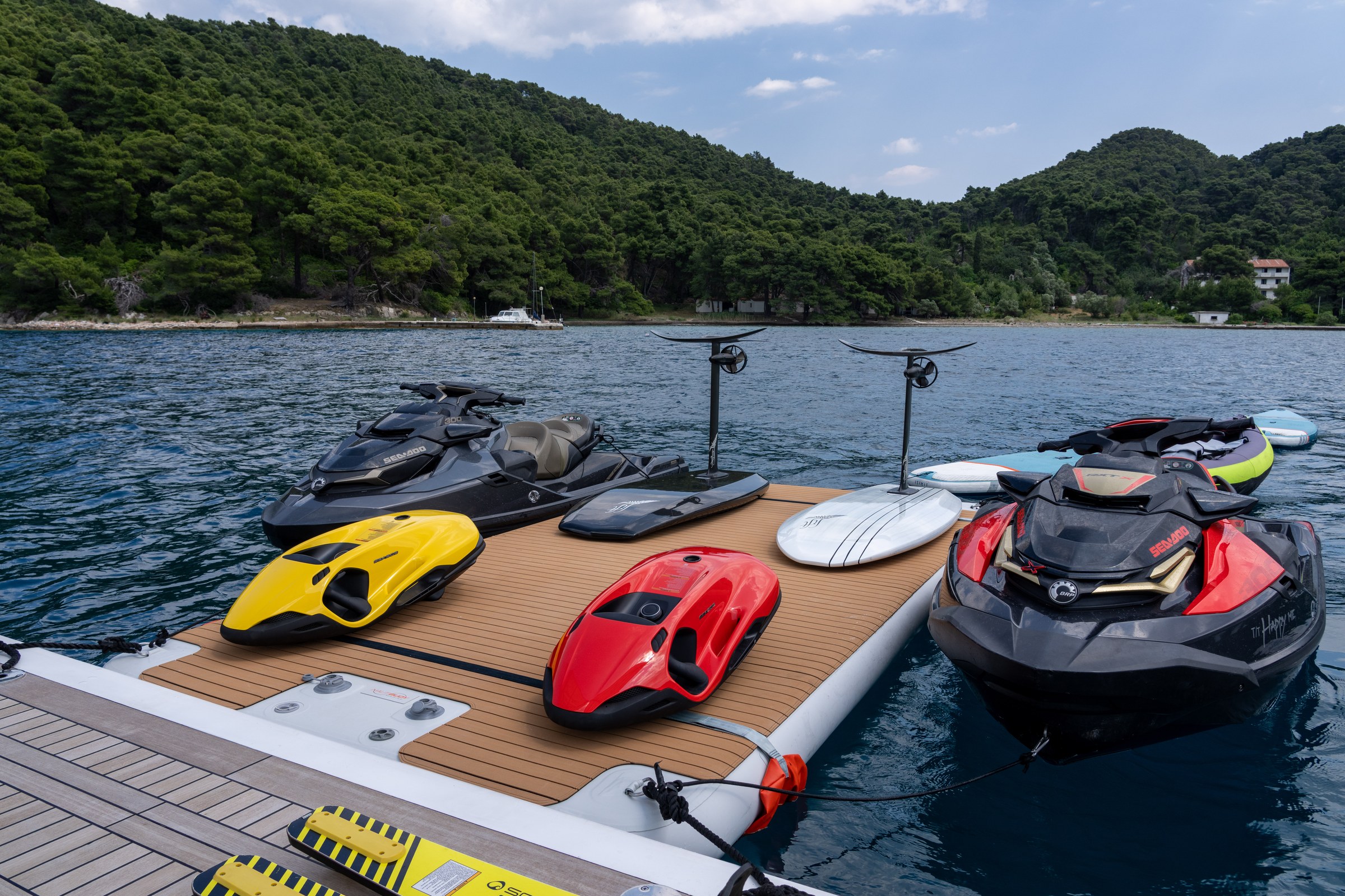 HAPPY ME — Stern swim platform with water toys deployed in the sea