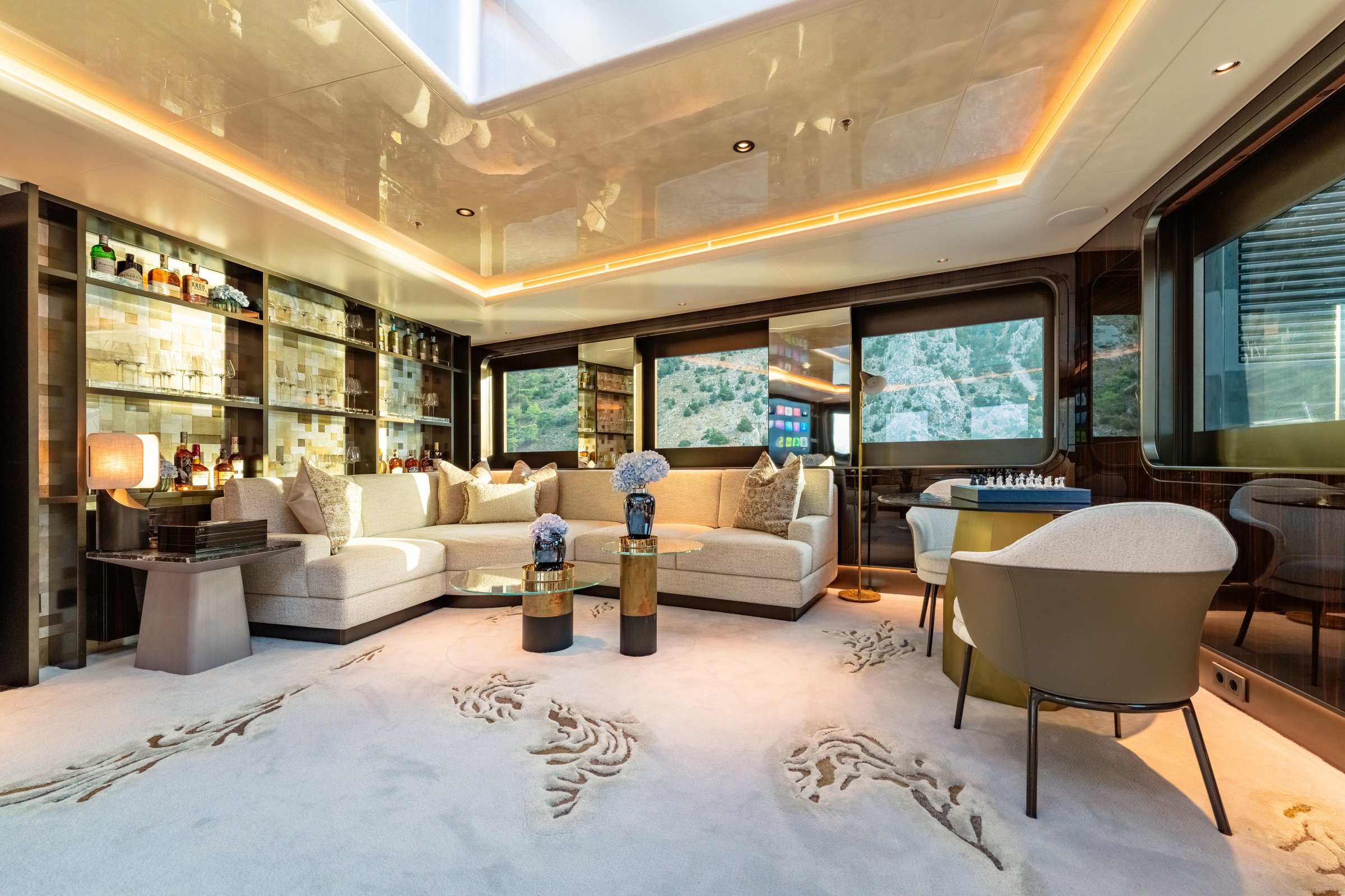 AFTER YOU — Upper observation lounge with bar and mountain views