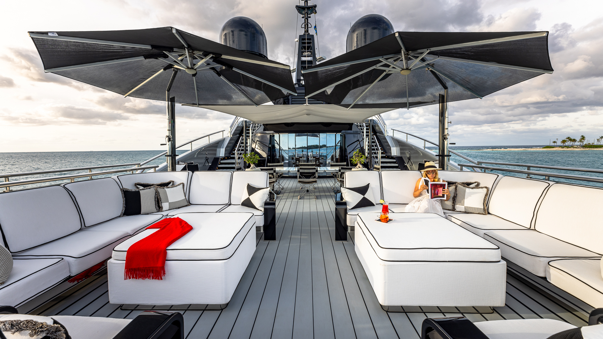 OKTO sun deck lounge with shaded seating and day beds