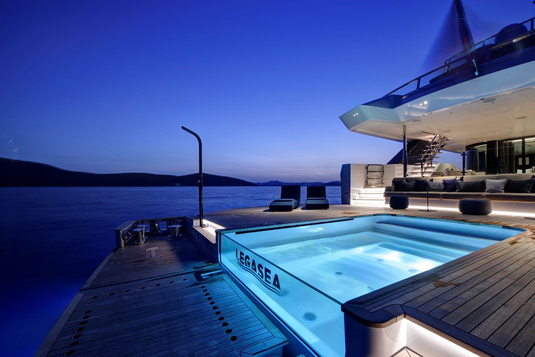 LEGASEA — Illuminated pool at dusk