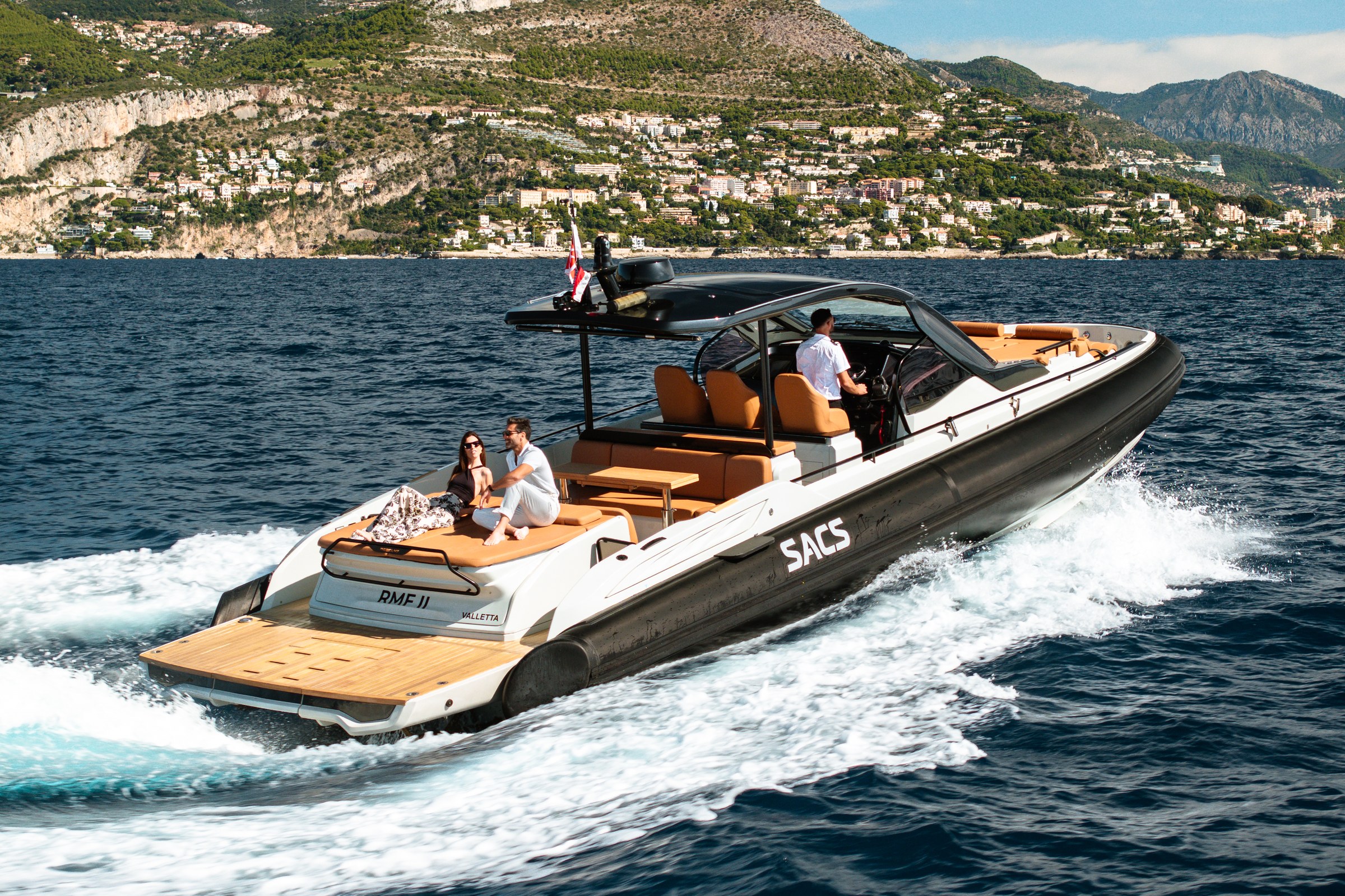 RMF II SACS tender underway with guests and crew