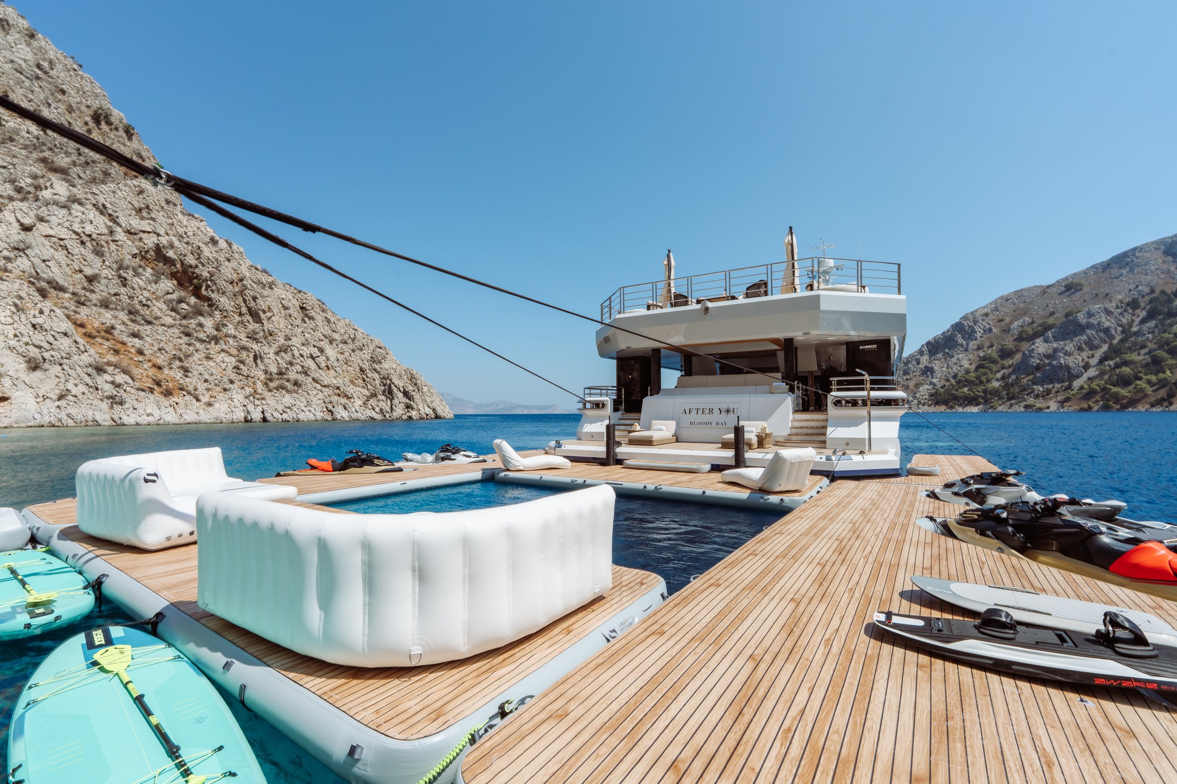 AFTER YOU — Floating beach club dock with sea pool and paddleboards