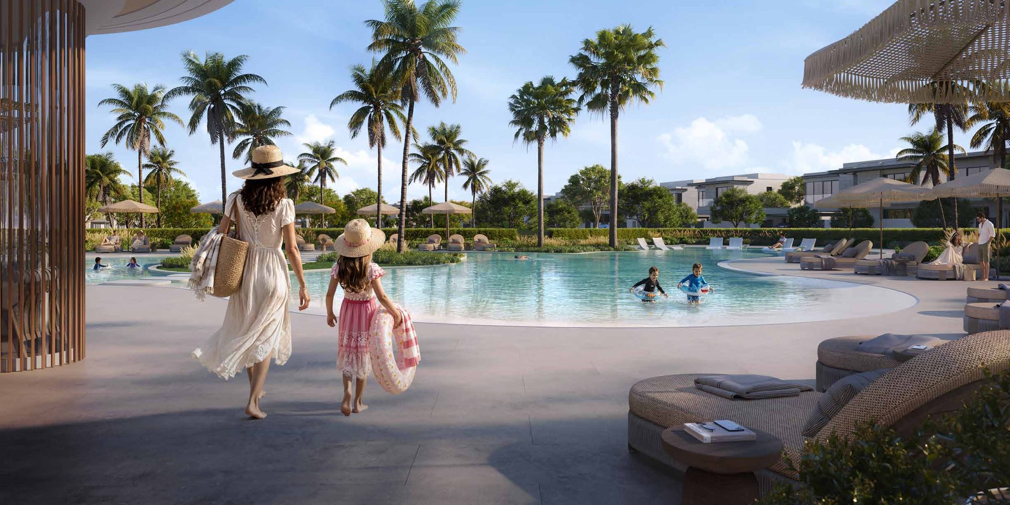 Community pool at Talay Beach, Saadiyat Island, Abu Dhabi, with a shaded pavilion and loungers