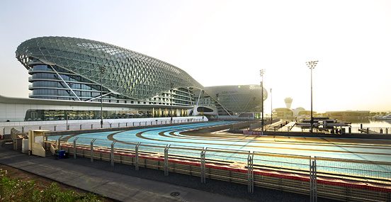 The Yas Hotel grid shell crossing above the track at Yas Marina Circuit