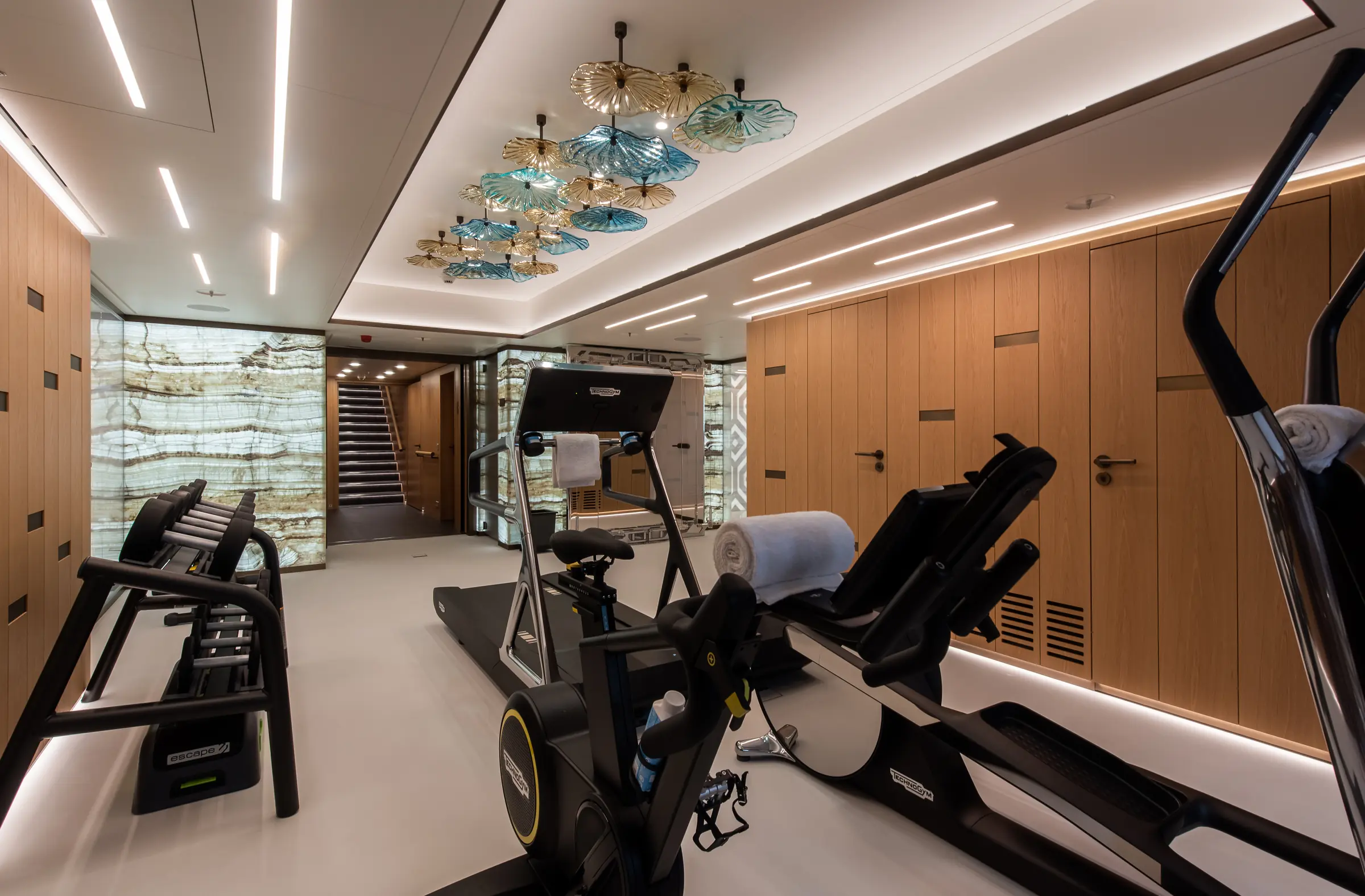 Technogym-equipped fitness room aboard LA DATCHA