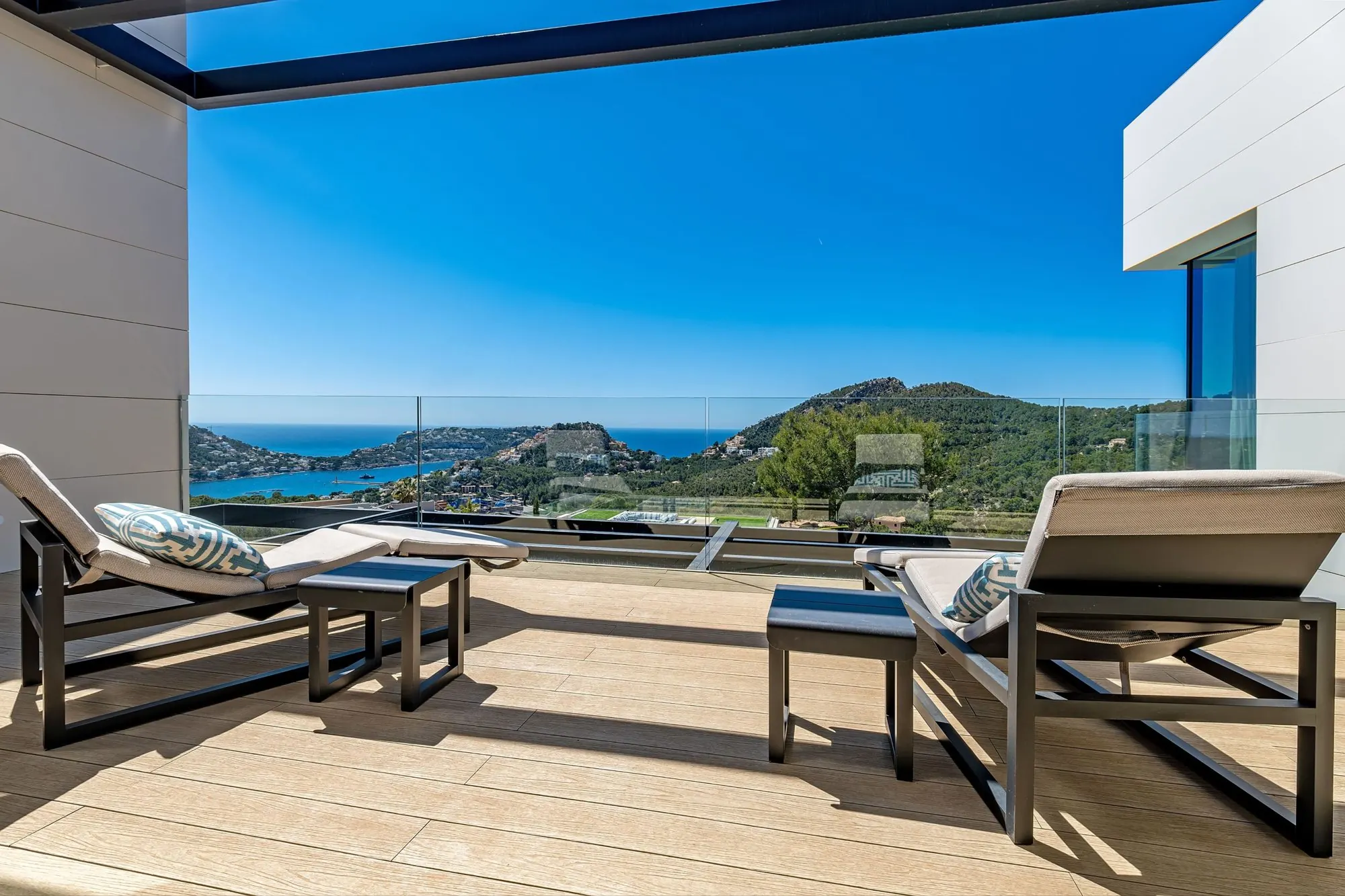Cinema in the guest house of the Port d'Andratx villa, with tiered seating facing the screen